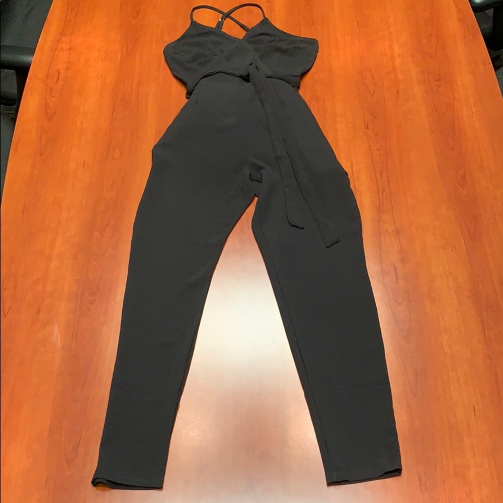 Never worn, stylish black jumpsuit